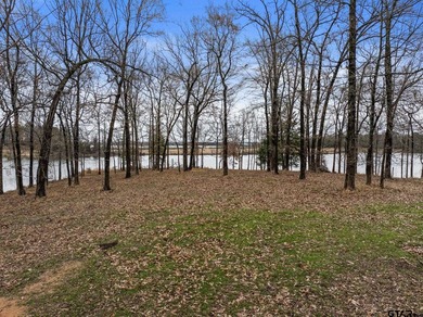 Discover the perfect waterfront retreat with this 1.09 +/- acre - photo 5