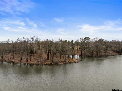 Discover the perfect waterfront retreat with this 1.09 +/- acre - photo 10