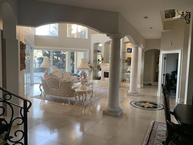 A magnificent custom Mediterranean estate situated on 100 ft of - photo 15