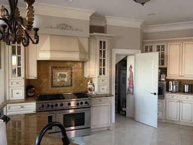 A magnificent custom Mediterranean estate situated on 100 ft of - photo 20