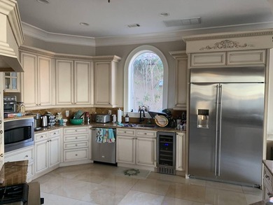 A magnificent custom Mediterranean estate situated on 100 ft of - photo 21
