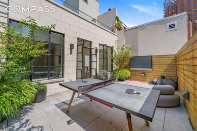 Spanning 4,500 square feet, this duplex penthouse with a private - photo 12