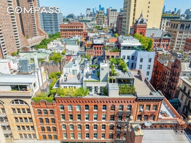 Spanning 4,500 square feet, this duplex penthouse with a private - photo 14