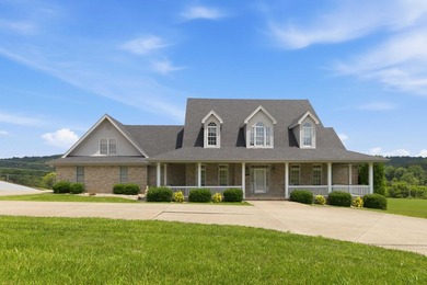 Nestled along the 7th fairway of the highly desirable Eagle's - photo 1