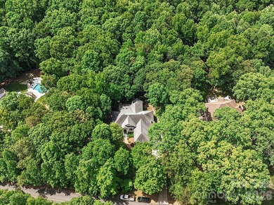 Custom-built home on 1.82 heavily wooded acres offering - photo 42