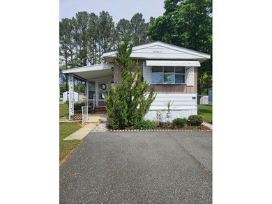 Come see this charming home located in the sought after 55+ - photo 2