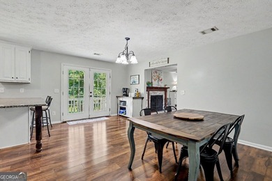 Welcome home to this charming ranch-style property offering the - photo 11