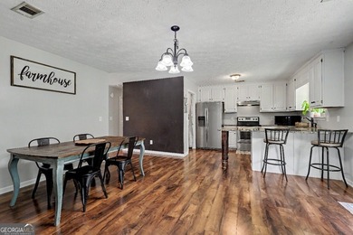 Welcome home to this charming ranch-style property offering the - photo 13