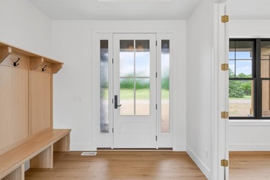 Experience luxury living in this custom-built two-story home by - photo 3