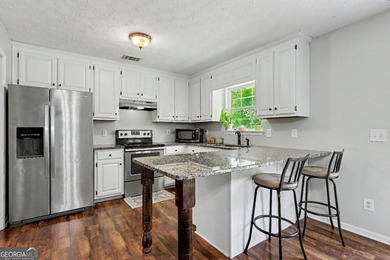 Welcome home to this charming ranch-style property offering the - photo 15