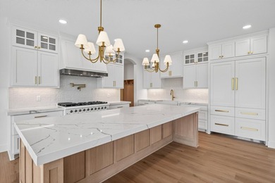 Experience luxury living in this custom-built two-story home by - photo 8