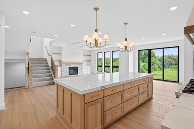Experience luxury living in this custom-built two-story home by - photo 10