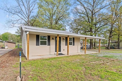 Completely rebuilt and beautifully updated, this Lake Conway - photo 1