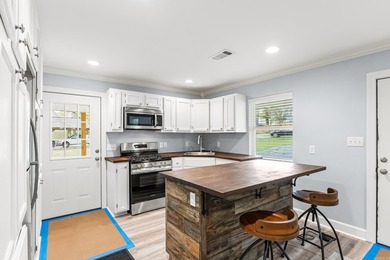 Completely rebuilt and beautifully updated, this Lake Conway - photo 7