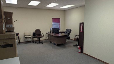 This property features 4 offices with a reception area. Large