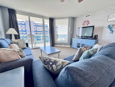 Discover your coastal oasis in this charming second-row condo