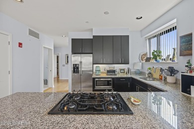 Nestled in the heart of downtown, this modern boutique building - photo 12