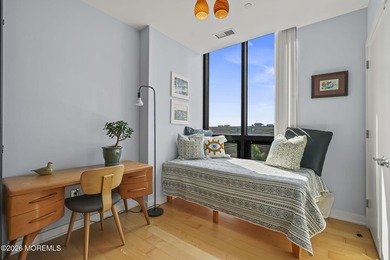 Nestled in the heart of downtown, this modern boutique building - photo 17