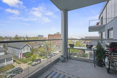 Nestled in the heart of downtown, this modern boutique building - photo 20