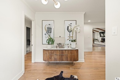 This beautifully renovated waterfront home blends modern - photo 2