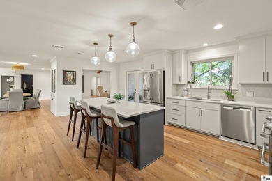 This beautifully renovated waterfront home blends modern - photo 3