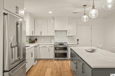 This beautifully renovated waterfront home blends modern - photo 5