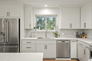 This beautifully renovated waterfront home blends modern - photo 6