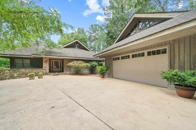 Welcome to a waterfront sanctuary nestled among the trees in the - photo 12