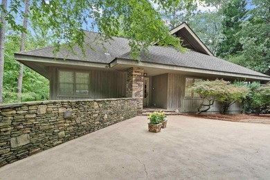 Welcome to a waterfront sanctuary nestled among the trees in the - photo 13