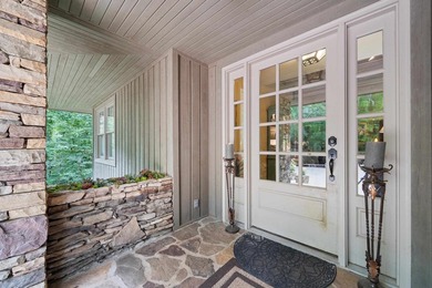 Welcome to a waterfront sanctuary nestled among the trees in the - photo 15