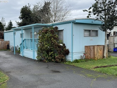 This sweet and comfortable two-bedroom, one-bath manufactured - photo 1