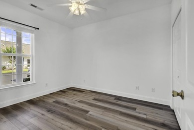 Welcome to this charming 3-bedroom, 2-bath home featuring a - photo 9