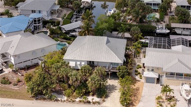 Stunning, Custom Coastal Canal Home located in Captain's Cove - photo 4