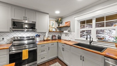 Price Improved to $599,500! Discover the perfect combination of - photo 12