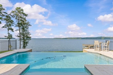 There are lake homes, and then there's this one. Sitting on a - photo 5