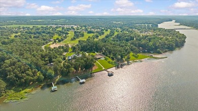 There are lake homes, and then there's this one. Sitting on a - photo 6