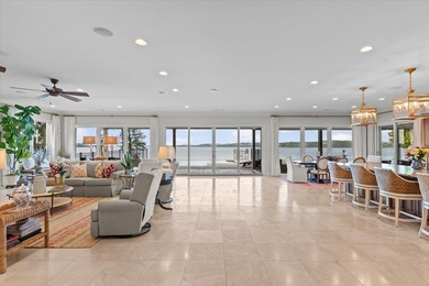 There are lake homes, and then there's this one. Sitting on a - photo 10