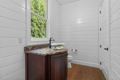 Perched above Lake Glenville with sweeping year-round views of - photo 34