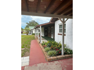 Discover the charm of true Florida living in this Fisherman's - photo 2