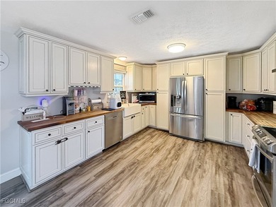 Discover this beautifully updated 4-bedroom, 2-bath home - photo 4