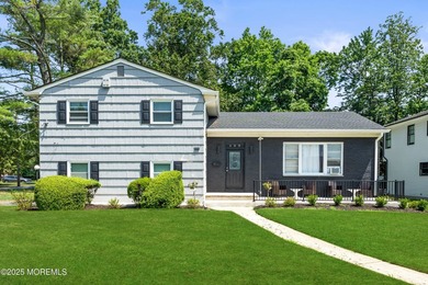Nestled in the heart of prestigious Deal Park, this exceptional - photo 4