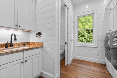 Perched above Lake Glenville with sweeping year-round views of - photo 58