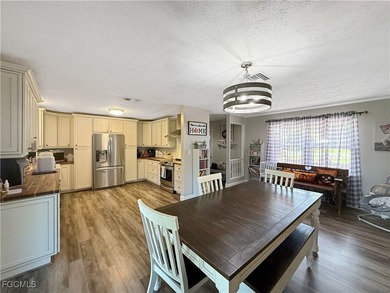 Discover this beautifully updated 4-bedroom, 2-bath home - photo 9