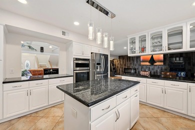 Perched on the Bay Park hillside, this 4,212 sq ft residence - photo 7