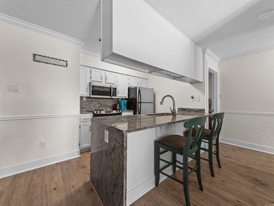 This ENTRY LEVEL condo, with NO stairs, feels less like a condo - photo 7