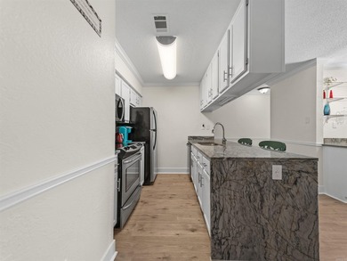 This ENTRY LEVEL condo, with NO stairs, feels less like a condo - photo 8