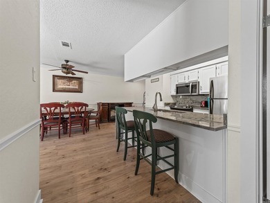 This ENTRY LEVEL condo, with NO stairs, feels less like a condo - photo 9