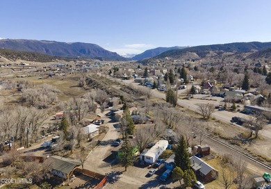 Large lot with great development potential, or just sit back and - photo 1