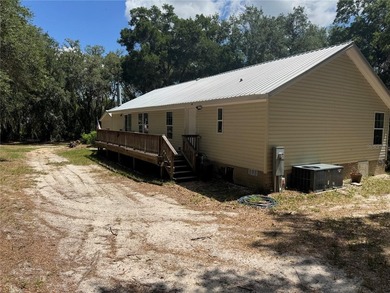 Very close proximity to Little Lake Weir! This rare 4.42-acre - photo 3