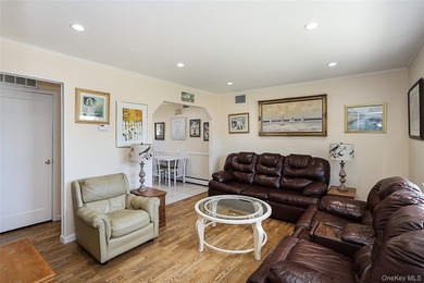 Welcome home to this spacious 6-bedroom, 2-bath Colonial nestled - photo 2
